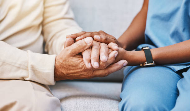 holding hands; nurse; geriatric